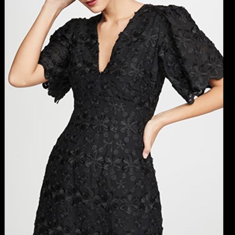 Dress by La Maison Talulah. Limousine mini lace dress with sleeves.